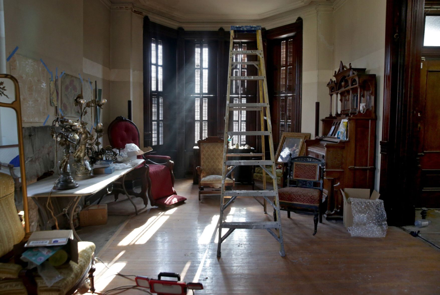 Kaleb Higgins restores an old house, while YouTube watches.